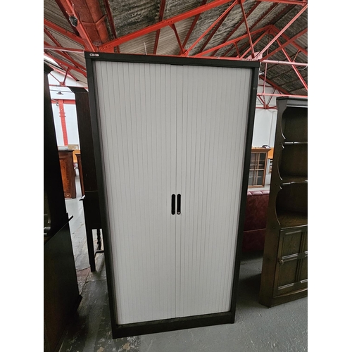 432 - A tall metal office cabinet

Height 198cm, Width 100cm, Depth 49cm