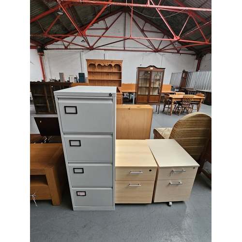 436 - A metal four drawer filing cabinet and two wooden office drawers