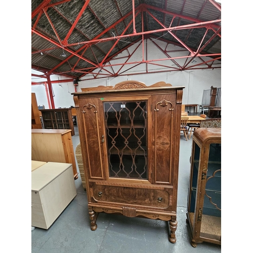 437 - A walnut glass and fretwork front china cabinet

Height 165cm, Width 94cm, Depth 38cm