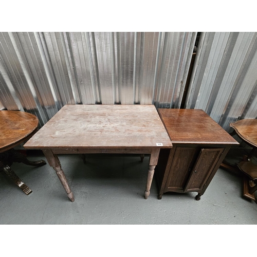 444 - A single drawer desk together with an oak record cabinet