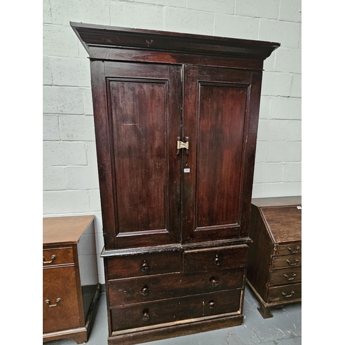 450 - An oak linen press

Height 219cm, Width 110cm, Depth 51cm