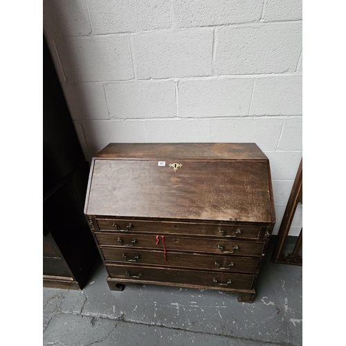 451 - An oak Victorian bureau on bracket feet

Height 98cm, Width 99cm, Depth 48cm