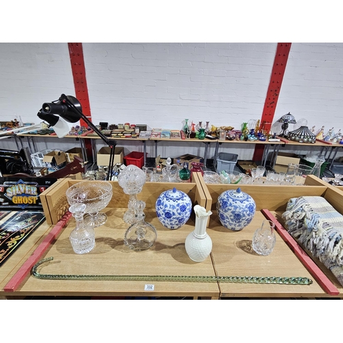 332 - A Beleek vase, two blue and white ginger jars, glass walking cane, cut glass decanters etc