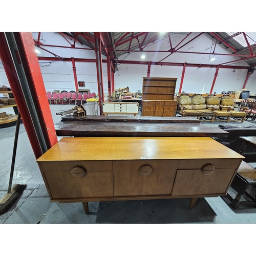 426 - A mid century teak sideboard

H76cm   W182cm   D43cm