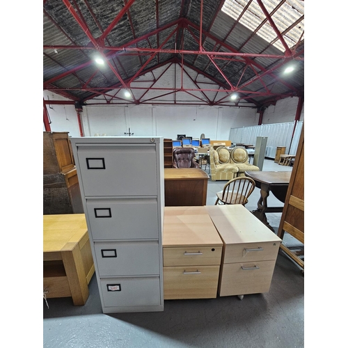 439 - A metal four drawer filing cabinet and two wooden office drawers