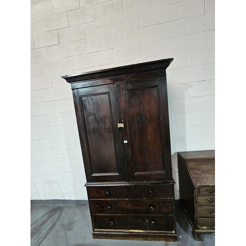 448 - An oak linen press

Height 219cm, Width 110cm, Depth 51cm