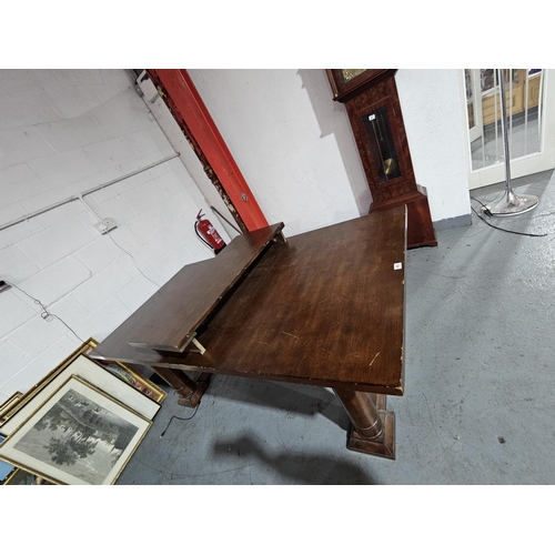 460 - An extending canon leg refectory dining table in mahogany