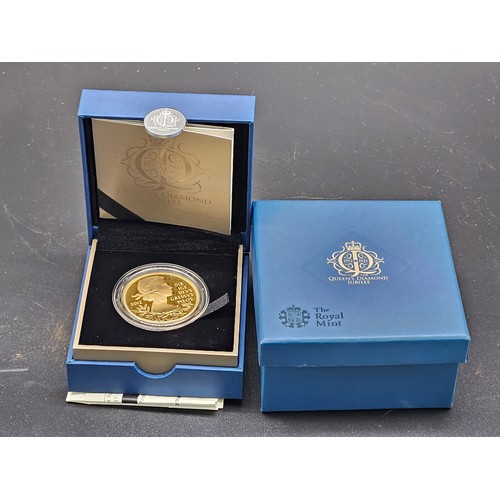 507 - A Royal Mint Queen's Diamond Jubilee Five Pound gold plated silver Limited Edition proof coin in ori... 