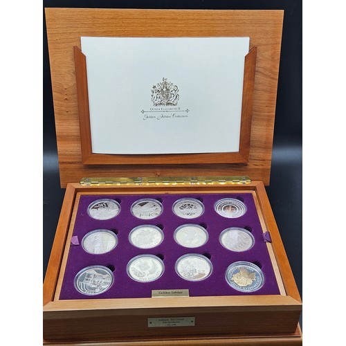 508 - A boxed set of 24 Silver Queen Elizabeth II 