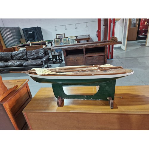 360 - A pond yacht, dressing table mirror, brass fire dogs, brass coal scuttle, etc