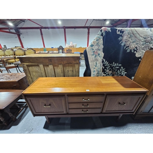 430 - A teak sideboard

H76cm   W163cm   D43cm