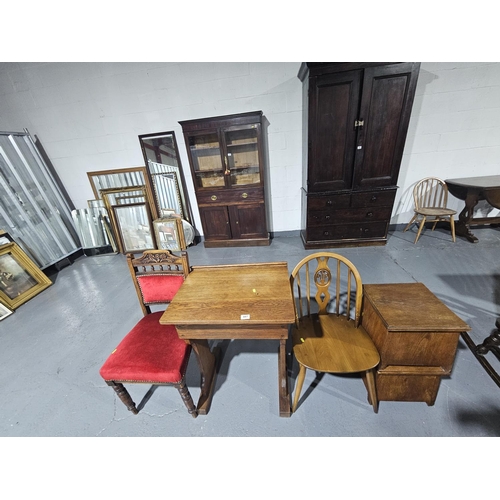 441 - An Oak desk, hall chair, Ercol fleur de lys dining chair and two Oak stools