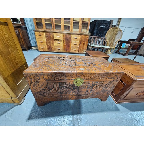 423A - A carved Camphor wood chest with lock
H58cm    W105cm    53cm