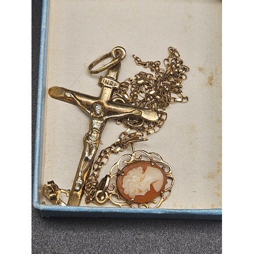 505 - A 9k gold crucifix, a 9k gold cameo pendant and scrap gold - combined weight including cameo is 4.7 ... 