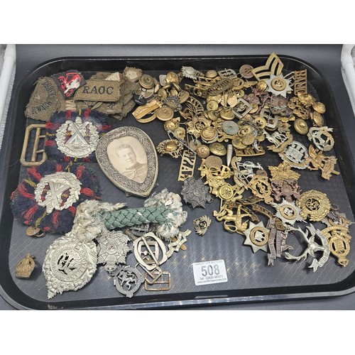 508 - A collection of military badges and buttons