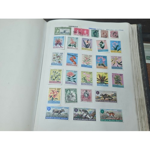 531 - 3 good albums of stamps. 1 album of world stamps, 1 album containing Penny Reds, Blues, 1/2 pennies ... 