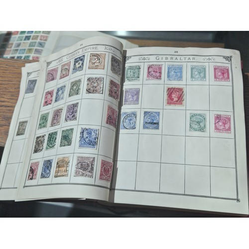 531 - 3 good albums of stamps. 1 album of world stamps, 1 album containing Penny Reds, Blues, 1/2 pennies ... 