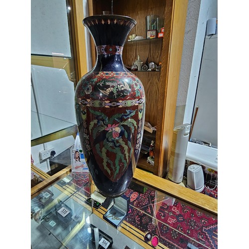 532 - A very large early Cloisonne vase with cockerel and dragon decoration - 24 inches tall (an area of d... 