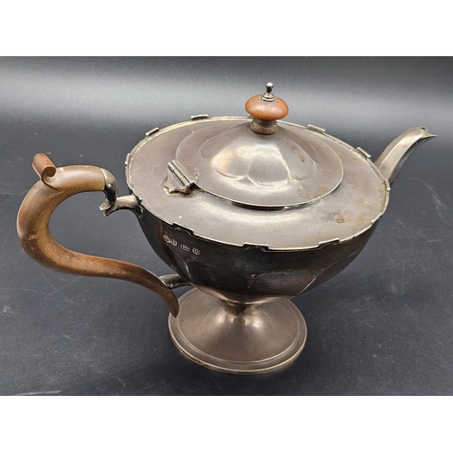 520 - A hallmarked silver teapot - hallmarks for Birmingham - 1913 - Mappin and Webb - height 6 inches and... 