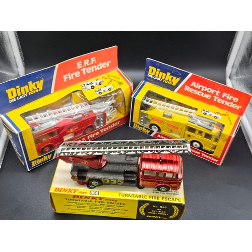 567 - A boxed Dinky 266 fire truck, a boxed Dinky 263 fire truck, a boxed Dinky 956 turntable fire escape ... 