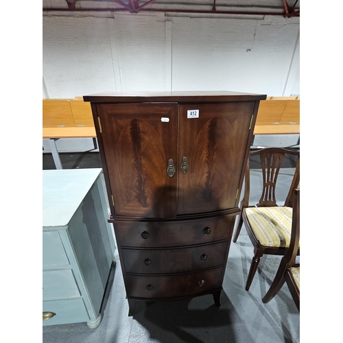 412 - A mahogany Strongbow furniture drinks cabinet
Height 129cm width 62cm depth 42cm