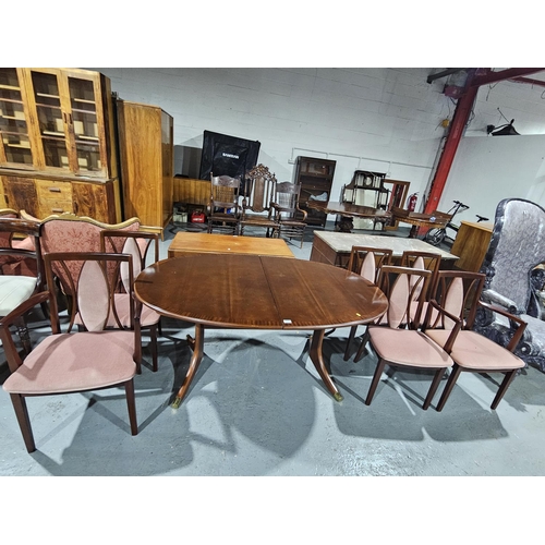 425 - A mahogany extending G Plan dining table with six chairs