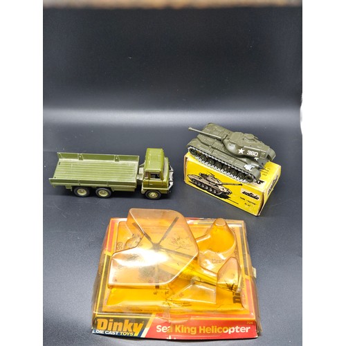 506 - A boxed Dinky 266 fire truck, a boxed Dinky 263 fire truck, a boxed Dinky 956 turntable fire escape ... 