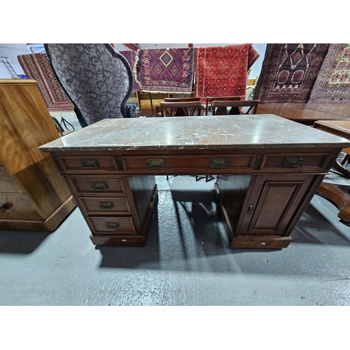 436 - An oak twin pedestal marble top desk