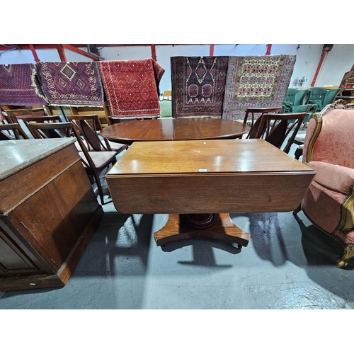 437 - A mahogany drop leaf dining table
Height 72cm, width 108cm, depth 47cm