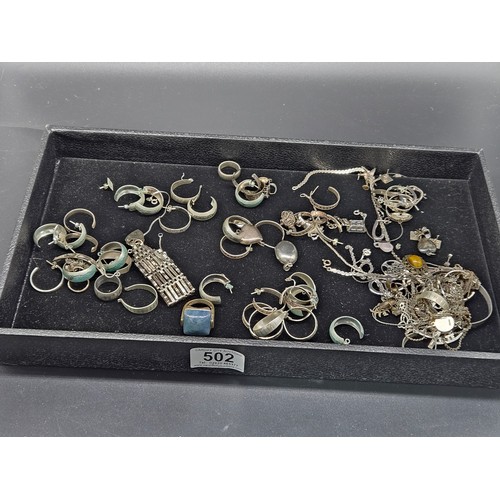 502 - A quantity of mostly silver jewellery - gate bracelet, bangle, earrings, chains, etc - total weight ... 