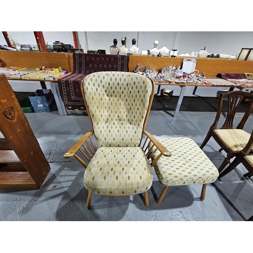 409 - An Ercol Evergreen Easy armchair with matching footstool