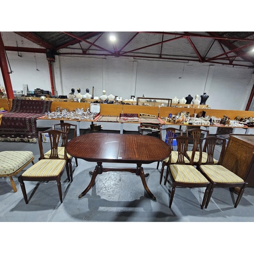 410 - A mahogany Strongbow furniture extending dining table and six chairs