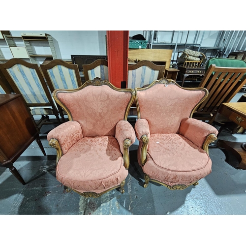 419 - A pair of upholstered French style armchairs