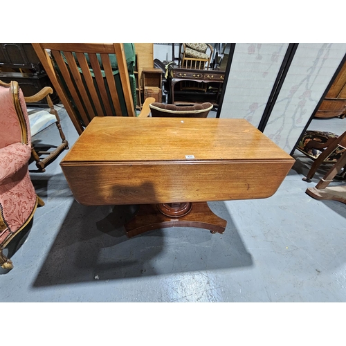 420 - A mahogany drop leaf dining table
Height 72cm, width 108cm, depth 47cm