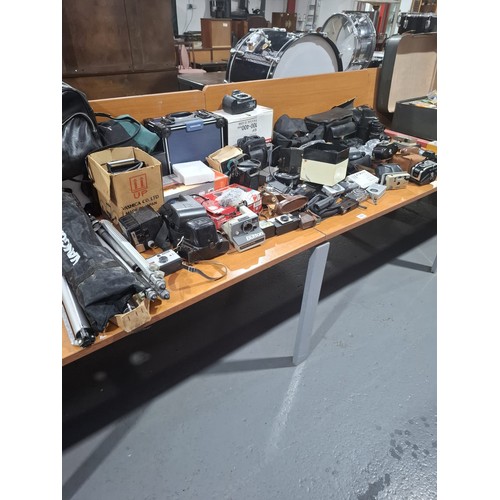 360 - A selection of Minota, Nikon, JVC, Sony cameras, lenses, recorders etc.