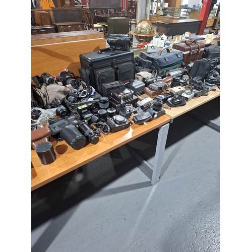 362 - A selection of JVC, Olympus, Halina, Praktica cameras, lenses etc.