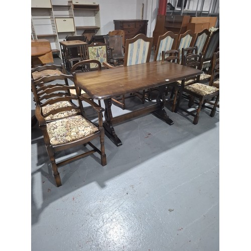 422 - An Ercol style refectory dining table with six chairs