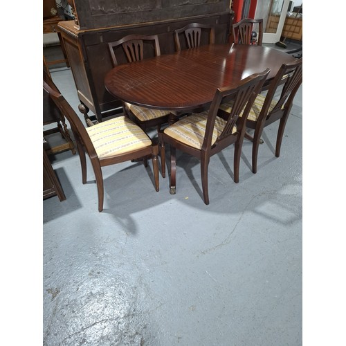 431 - A mahogany Strongbow furniture extending dining table and six chairs