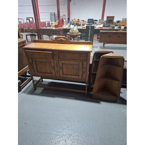 433 - An oak sideboard together with two G plan corner shelves