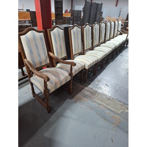 439 - A set of 10 oak framed upholstered dining chairs including 2 carvers