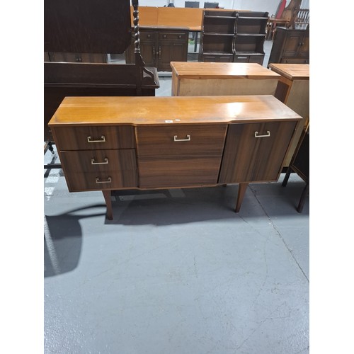 441 - A teak sideboard
H74cm  W137cm  D44cm