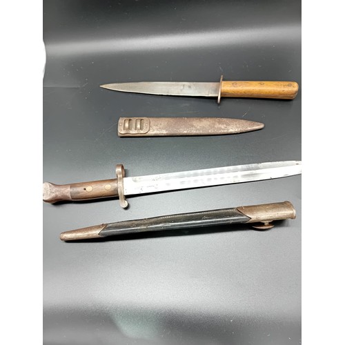 521 - A WWI Austrian trench knife - 'Heinr Zelinka' 14 inch total length together with a WWI era WW Greene... 