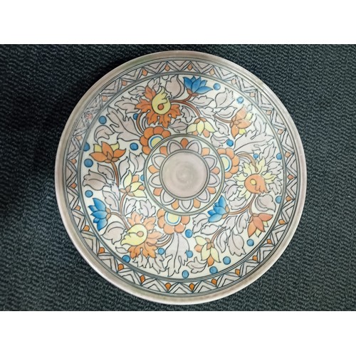 534 - A large Charlotte Rhead for Crown Ducal charger, - blue, orange and yellow floral decoration - Crown... 