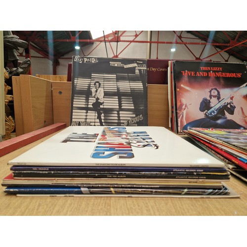 628 - A selection of vinyl records to include Iron Maiden, Metallica, Thin Lizzy, ACDC, Sex Pistols etc.