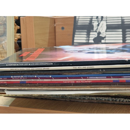 628 - A selection of vinyl records to include Iron Maiden, Metallica, Thin Lizzy, ACDC, Sex Pistols etc.