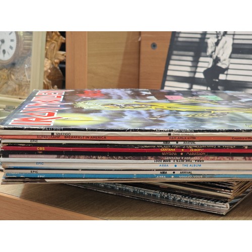 628 - A selection of vinyl records to include Iron Maiden, Metallica, Thin Lizzy, ACDC, Sex Pistols etc.
