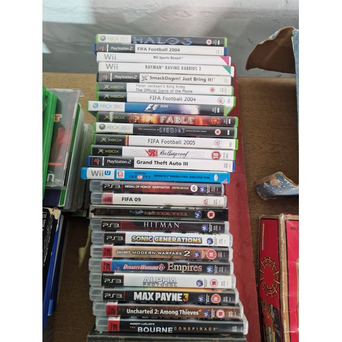 614 - A boxed Playstation 1 console with controllers, Nintendo Wii console, Xbox 360 console with controll... 