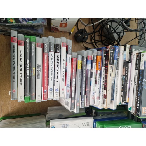 614 - A boxed Playstation 1 console with controllers, Nintendo Wii console, Xbox 360 console with controll... 