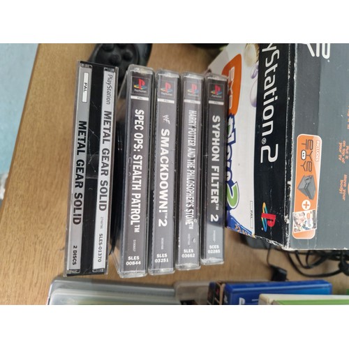 614 - A boxed Playstation 1 console with controllers, Nintendo Wii console, Xbox 360 console with controll... 