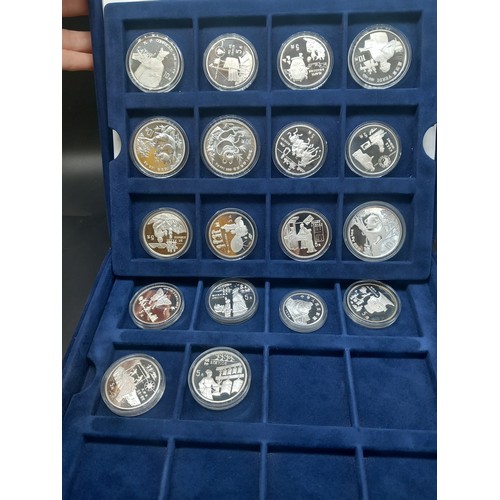 878 - A boxed collection of seventeen solid silver 